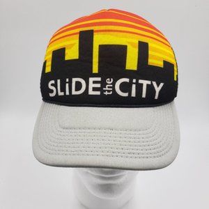 Colorful trucker hat 'Slide the City' Black Orange Sunset Cityscape
